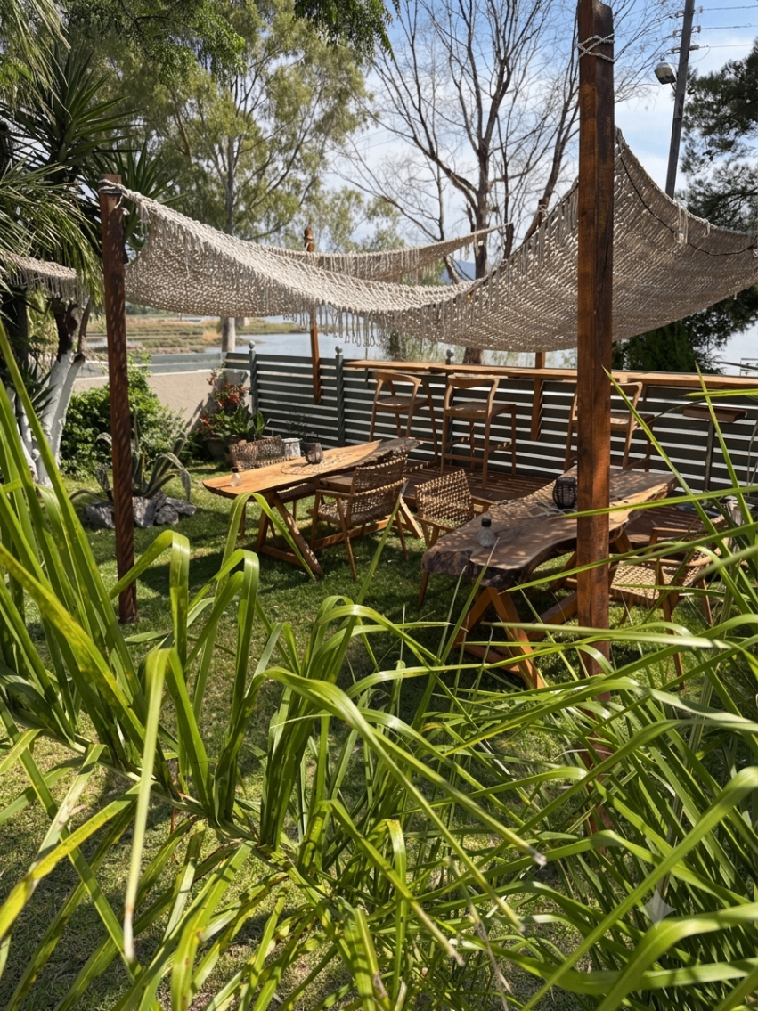 Lakeside seating under hammock canopies